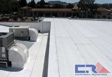 White industrial roof with two air conditioning units